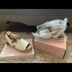 Platform sandals with ankle strap.